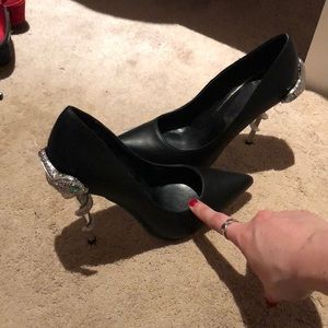 Black heels with the silver snake wrapped